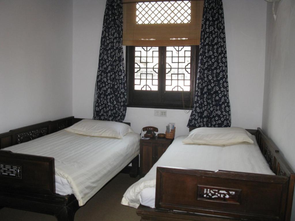 XI Di Travel Lodge Yi (Anhui) Cameră foto